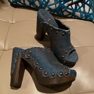 Stuart Weitzman distressed denim platforms.